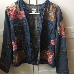 An embroidered flower Jean jacket.